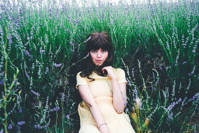 Portrait of woman on field