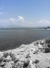 Scenic view of sea against cloudy sky