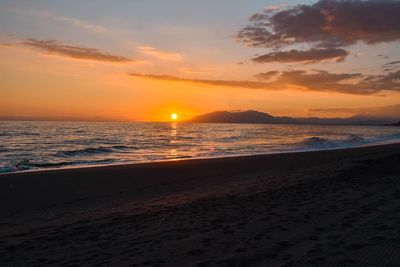 Scenic view of sea against sky during sunset