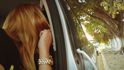 Woman sitting in car