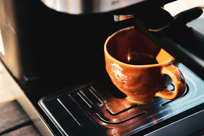High angle view of coffee cup on table