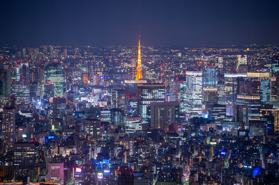 Night blurred bokeh light japan city office building, abstract background