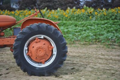 Close-up of tractor on field