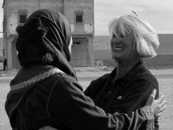 Portrait of a smiling woman outdoors