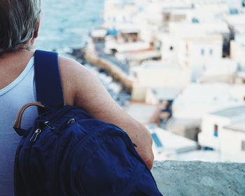 Rear view of woman with backpack