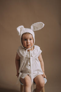 Portrait of cute girl wearing hat