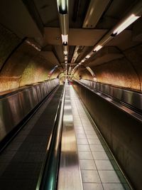 Interior of illuminated subway station