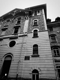 Low angle view of old building against sky