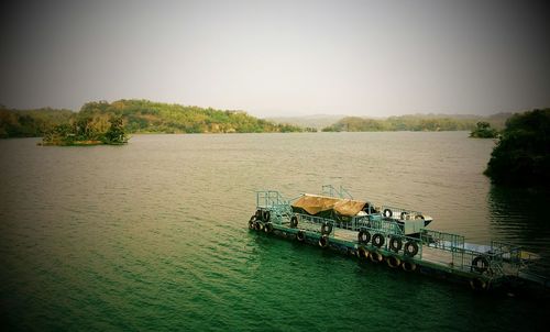 Scenic view of boats in river