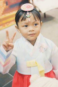 Smiling cute girl wearing traditional clothing