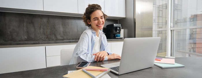 Young businesswoman working at office