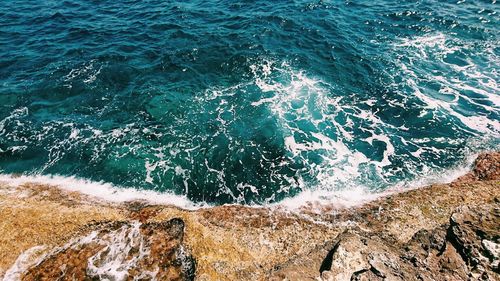 High angle view of rocks on beach