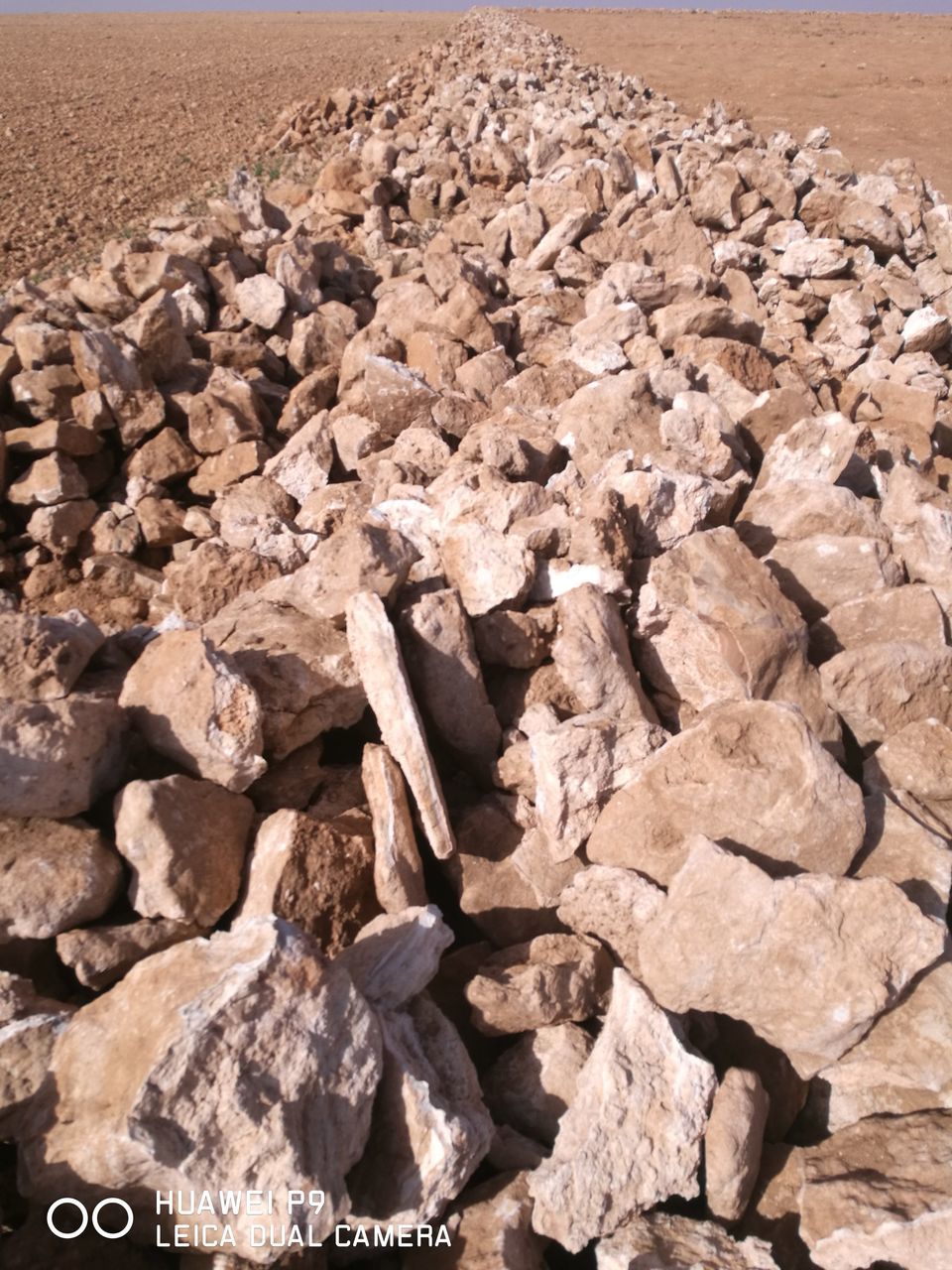 HIGH ANGLE VIEW OF STONES ON ROCK