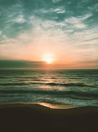 Scenic view of sea against sky during sunset