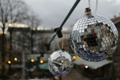 Close-up of disco balls outdoors