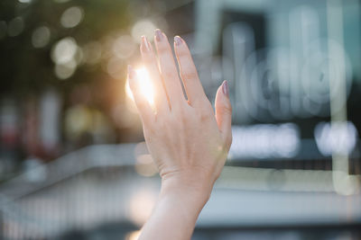 Cropped hand of woman gesturing