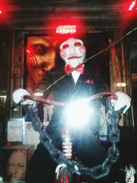 Man at illuminated music concert