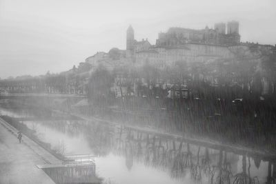 View of bridge over river during winter