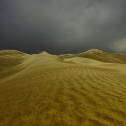 Scenic view of desert against sky