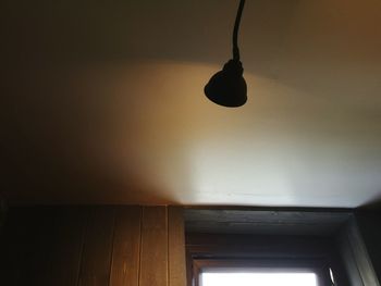 Low angle view of illuminated lamp