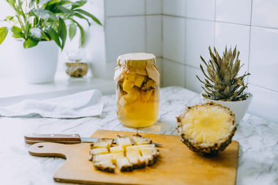 Fermented pineapple kombucha drink tepache. cooking process of homemade probiotic superfood 