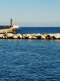 Scenic view of sea against clear sky