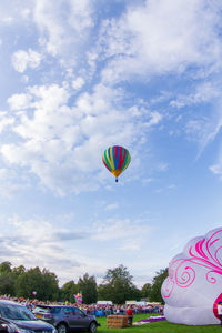 Low angle view of hot air balloons against sky