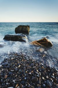 Scenic view of sea against clear sky