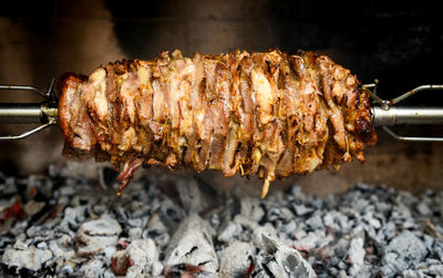 High angle view of meat on barbecue grill