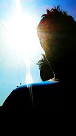 Low angle view of boat against blue sky