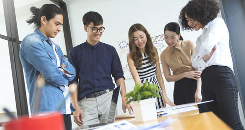 Group of people working on table