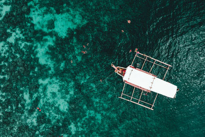 High angle view of boat floating on sea