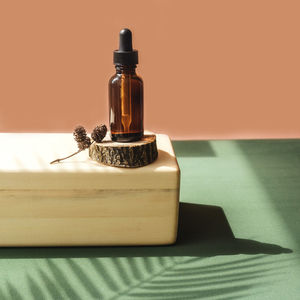 Close-up of glass bottle on table