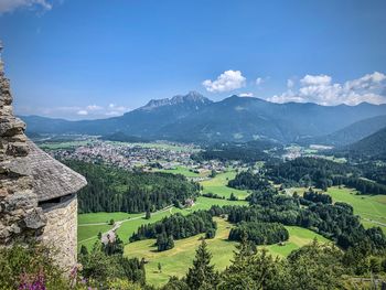 Scenic view of landscape and mountains against sky