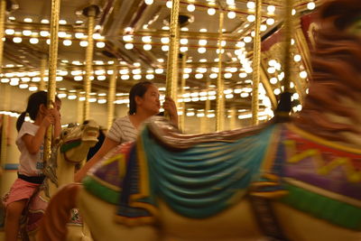 People at amusement park