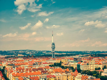 Aerial view of tv tower in prague zizkov under hot summer and clouds