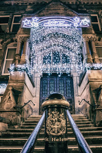 Low angle view of fountain against building