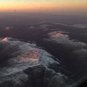 Aerial view of landscape at sunset