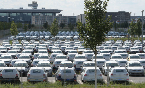 Row of cars in parking lot