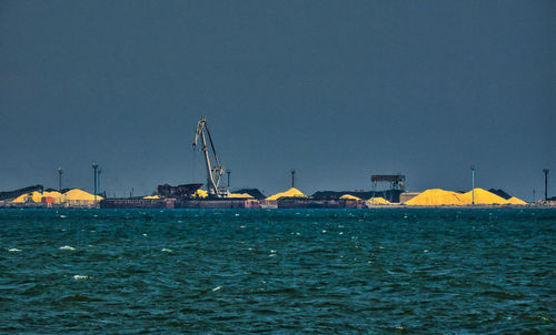 View of commercial dock against clear sky