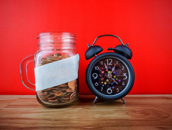 Close-up of clock on table