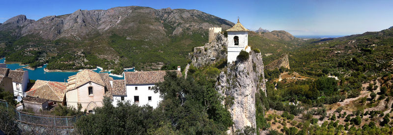 Buildings with mountains in background