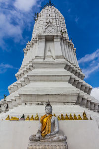 Low angle view of statue against building