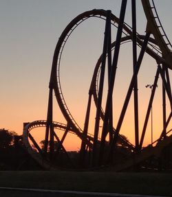 Silhouette bridge against sky during sunset