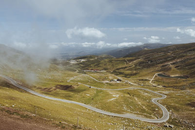 Winding road up to the mountains in alto campoo, cantabria, spain