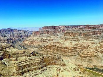 Scenic view of grand canyon against clear blue sky