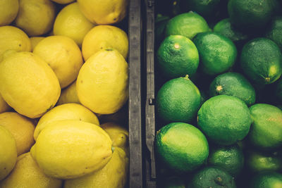 Full frame shot of fresh lemons for sale in market