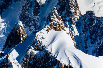 Scenic view of snowcapped mountains during winter