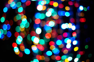 Defocused image of illuminated lights at night