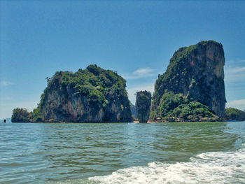 Scenic view of sea against clear blue sky